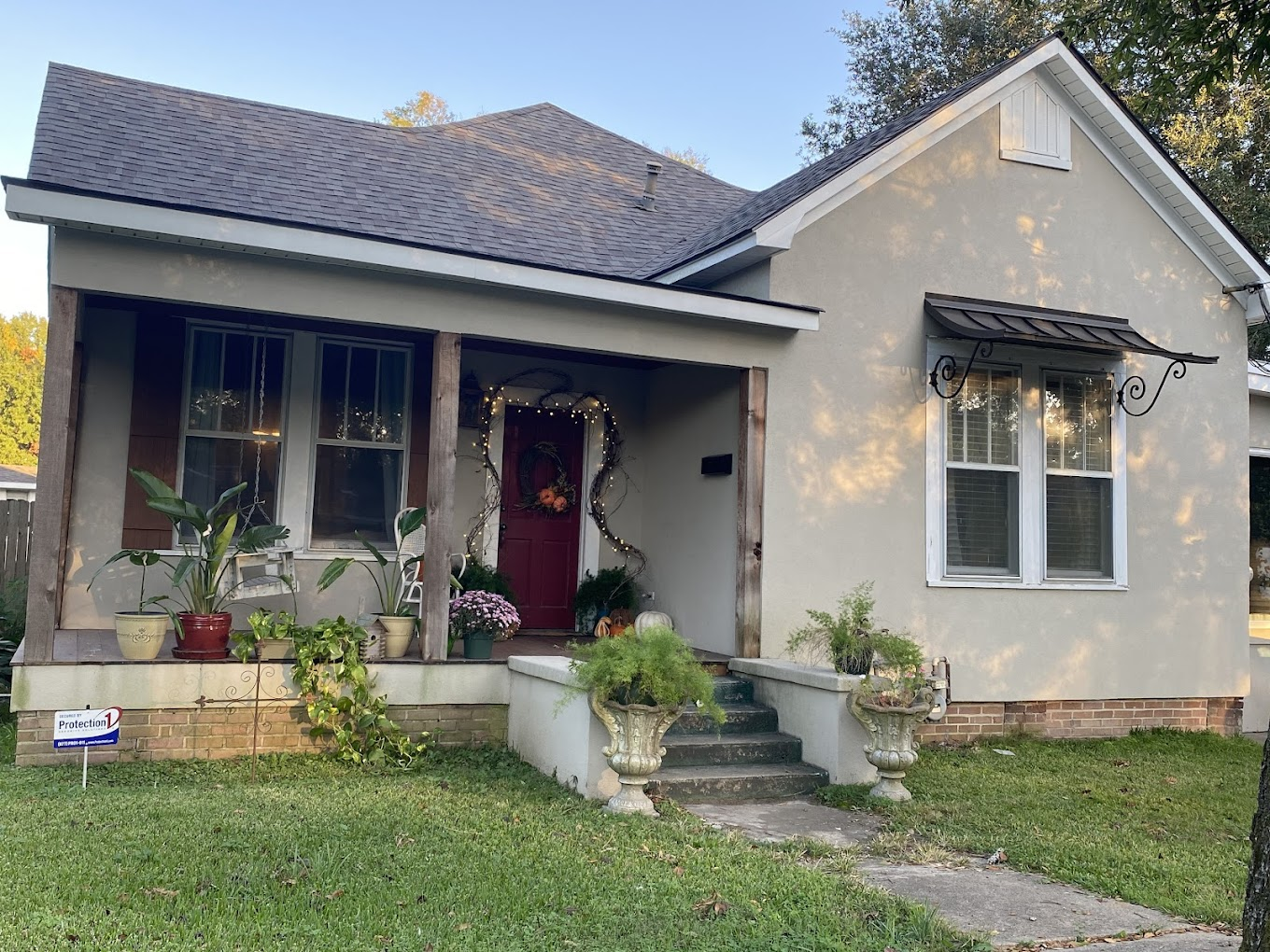 Drop Line Electric residential electrician installing outdoor lighting at home in Monroe LA